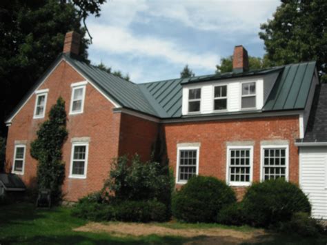 red brick houses with metal roof|metal roofs on brick houses.